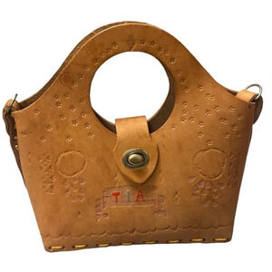 TIA  beautiful hand drilled small leather purse